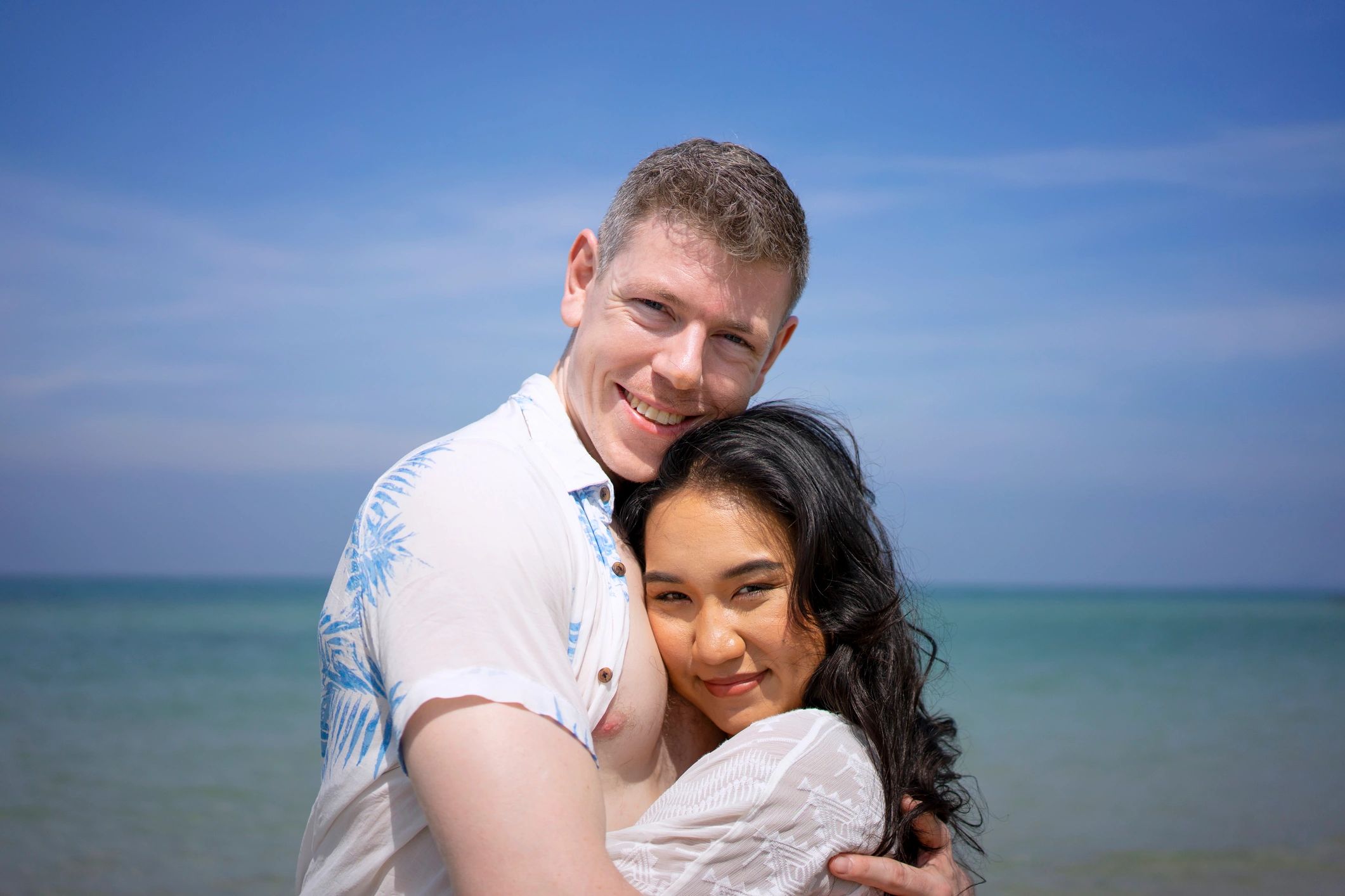 Beach couple portrait representing Wedlogue's film storytelling approach