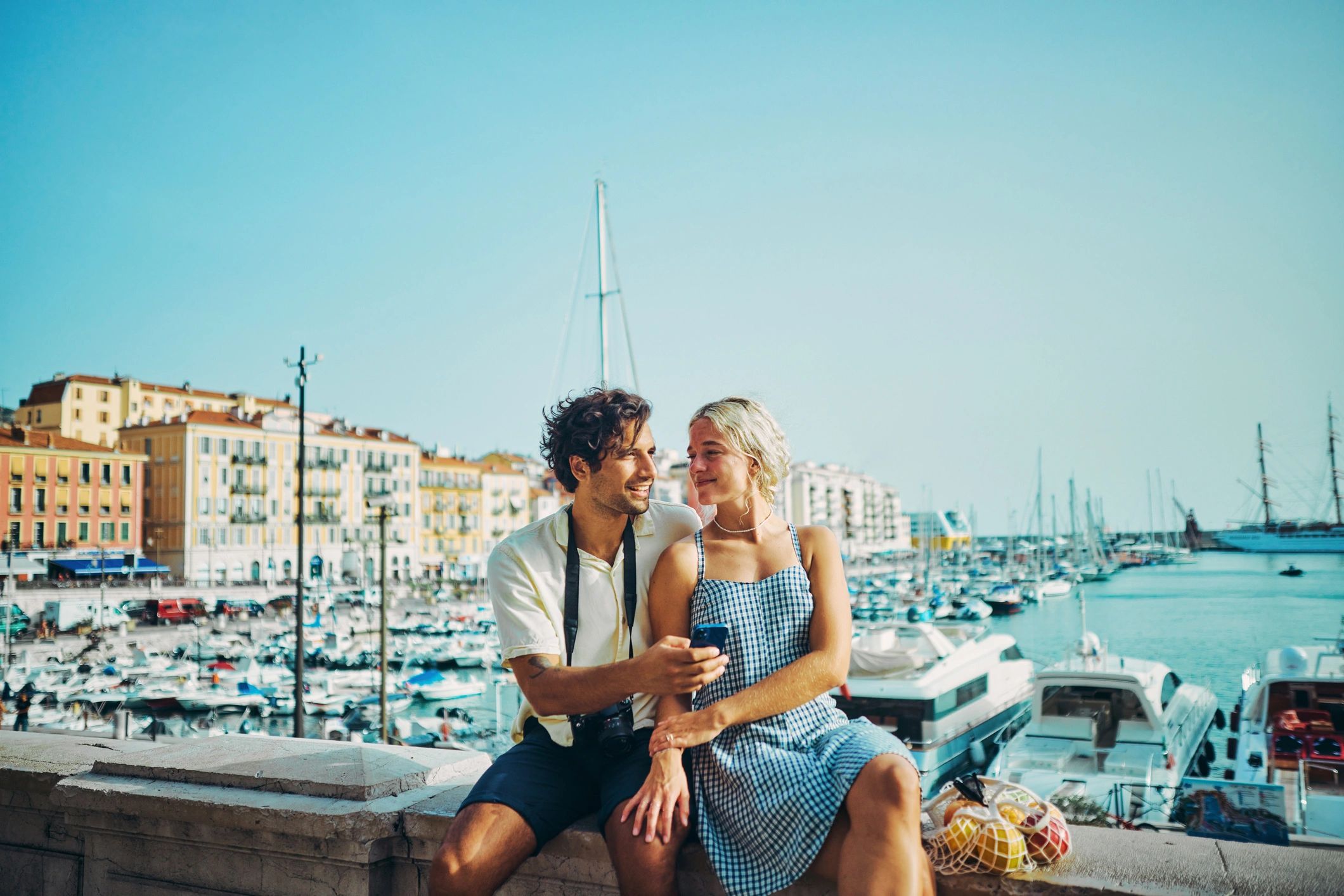 Couple enjoying a scenic engagement session by the coast