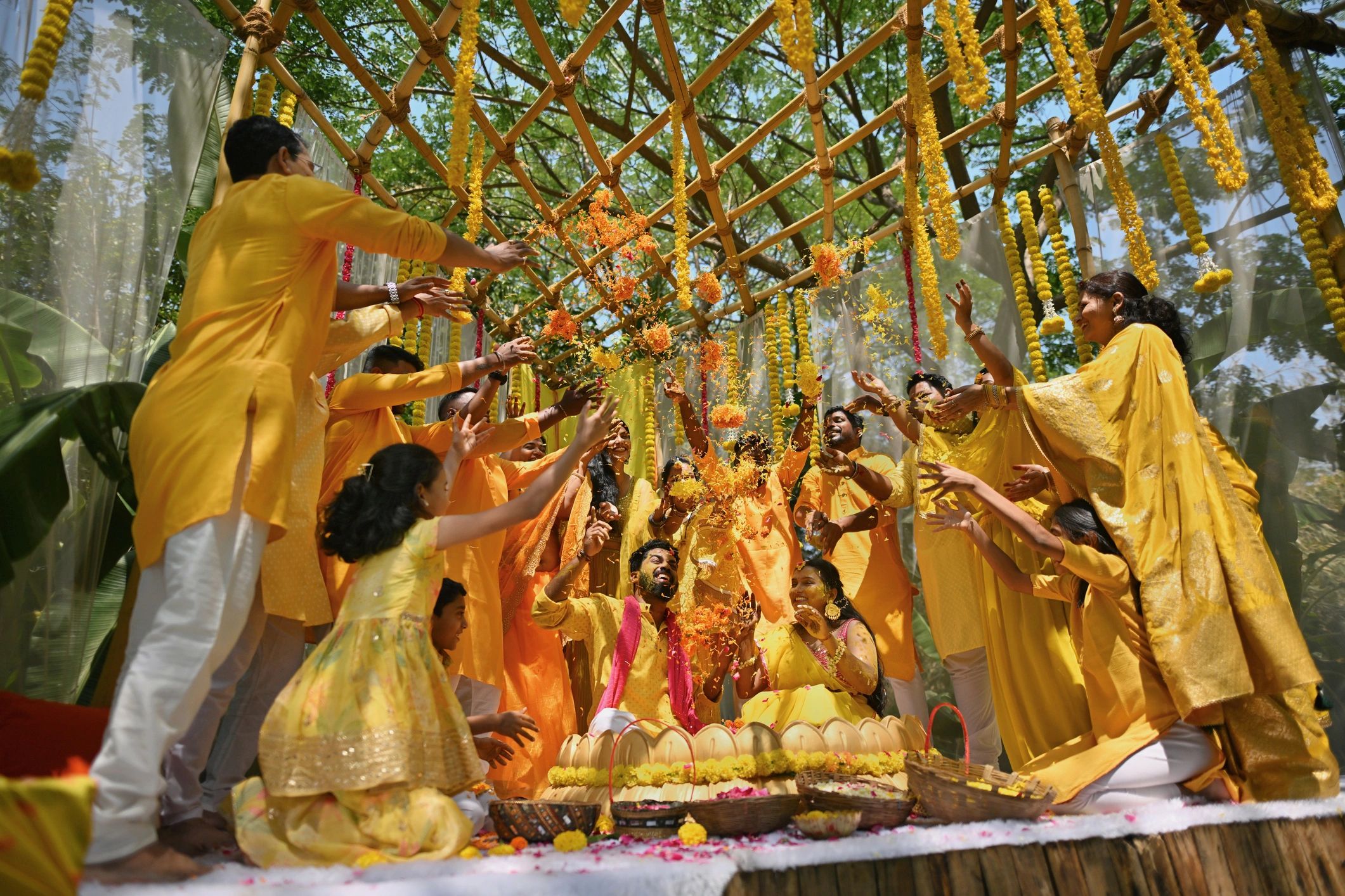 Bride and groom during a joyful haldi celebration