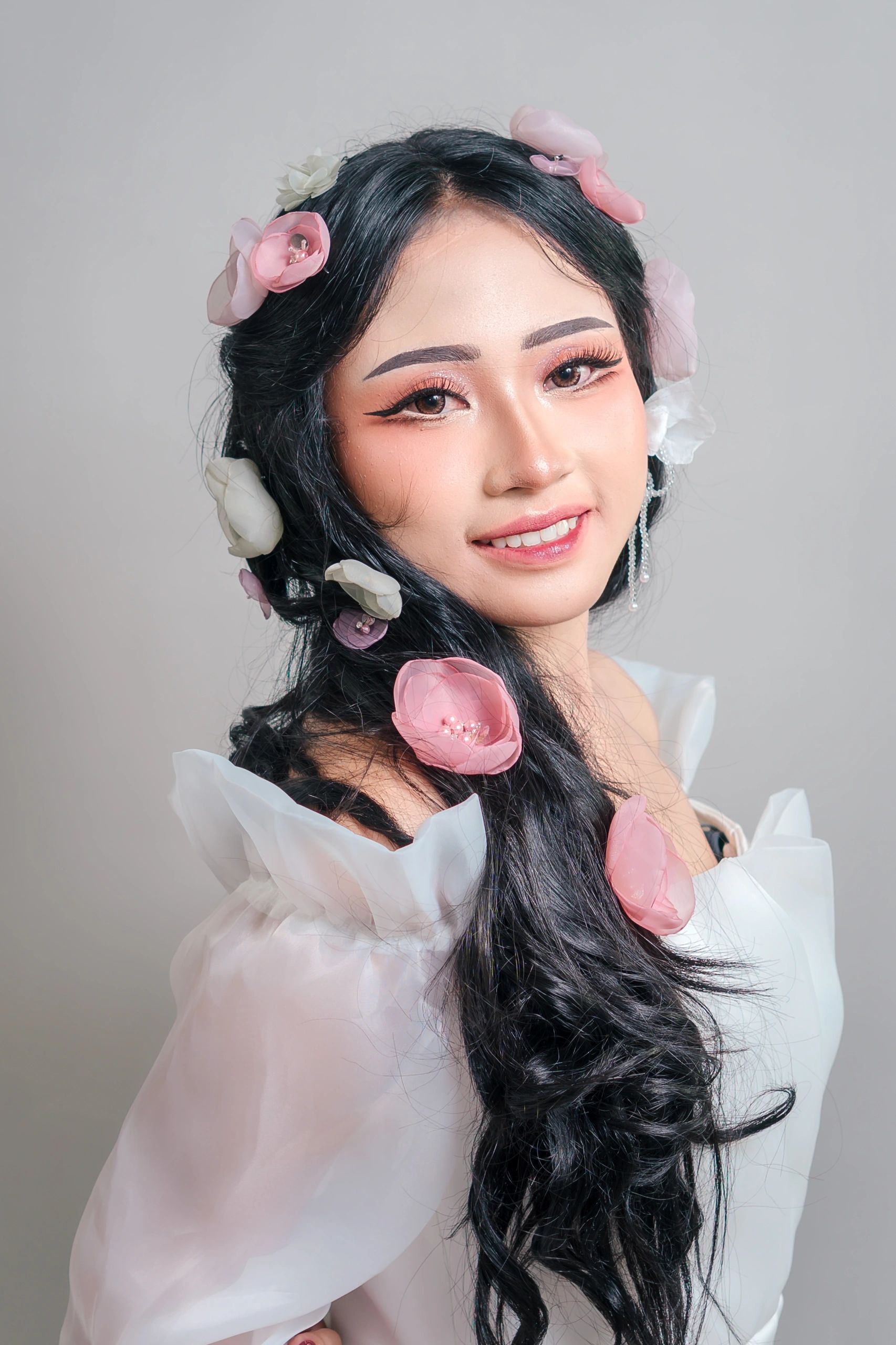 Editorial bridal portrait with floral styling