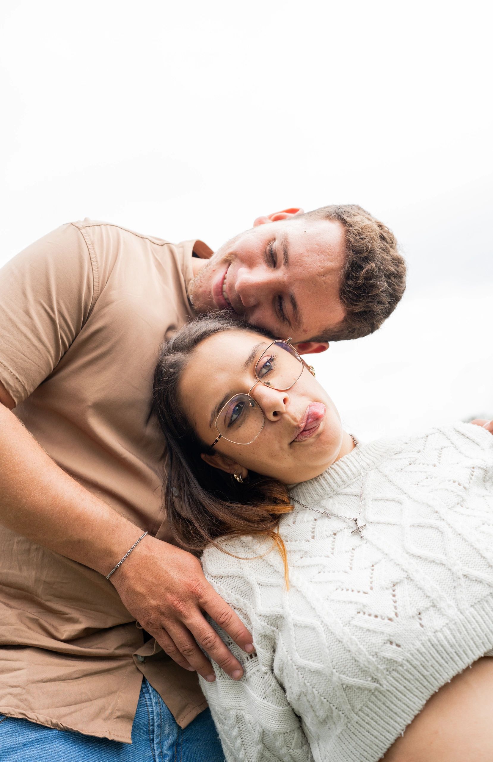 Fun and playful engagement portrait outdoors